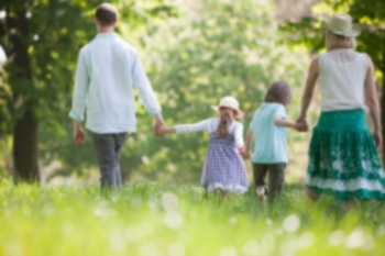 Family Therapy - Family walking together holding hands